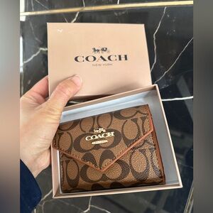 Coach Tan and Brown Signature Wallet